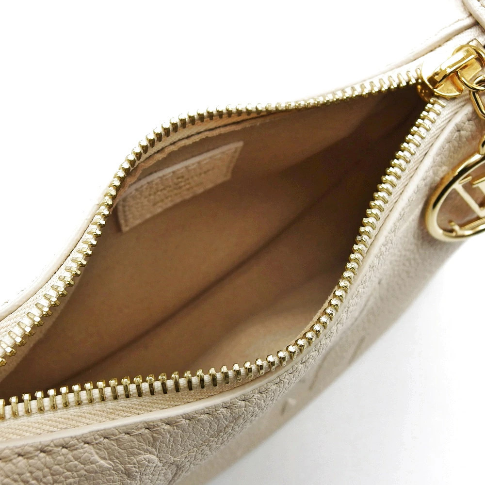 Louis Vuitton Moon Monogram Empreinte Leather Shoulder Bag Cream